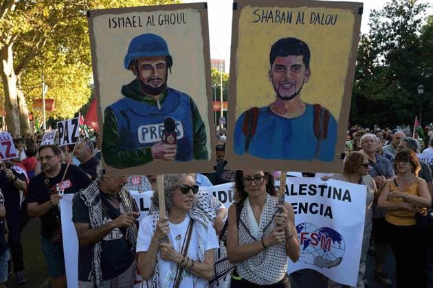 October 4, 2025, Madrid, Madrid, Spain: Protesters hold banners and Palestinian banners during a demonstration in solidarity with the Palestinians in the Gaza strip, in Madrid. Madrid Spain - ZUMA- Oc 20251004_zsp_d308_016 Copyright: xJuanxCarlosxLucasx