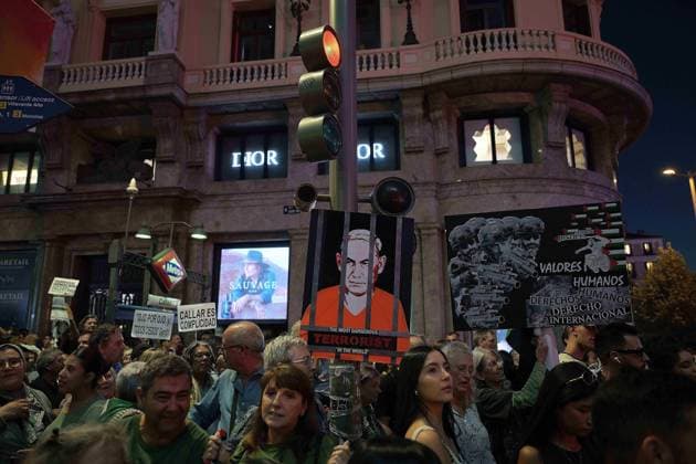 October 4, 2025, Madrid, Madrid, Spain: Protesters hold banners and Palestinian banners during a demonstration in solidarity with the Palestinians in the Gaza strip, in Madrid. Madrid Spain - ZUMA- Oc 20251004_zsp_d308_009 Copyright: xJuanxCarlosxLucasx