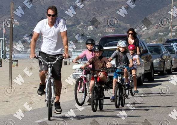 Rande Gerber, Presley Gerber, Kaia Gerber and Cindy Crawford Cindy Crawford on a family bicycle ride in Malibu Los Angeles, California - 14.11.09 * MAN CHARGED OVER CRAWFORD AND GERBER EXTORTION PLOT Cops in the U.S. have launched an international manhunt after charging a suspect over an attempt to extort $100,000 (£62,500) from CINDY CRAWFORD and her husband RANDE GERBER. Gerber paid Edis Kayalar, the acquaintance of a former nanny, $1,000 (£625) to keep a controversial snap of their young daughter bound to a chair in revealing clothing away from the media and internet. But Kayalar threatened to sell the picture to the press for $500,000 (£312,500) before he was deported to his native Germany in September (09). He continued his threa WENN 5386037.jpg