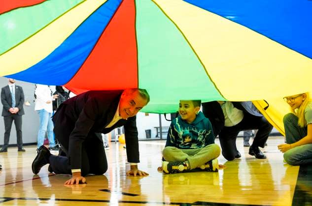 October 10, 2025, Ottawa, On, CAN: Prime Minister Mark Carney plays a parachute game with children at a community centre, before participating in an announcement in Ottawa, on Friday, Oct. 10, 2025. Ottawa CAN - ZUMAc35_ 20251010_zaf_c35_006 Copyright: xJustinxTangx