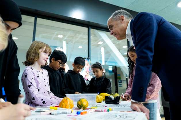 October 10, 2025, Ottawa, On, CAN: Prime Minister Mark Carney speaks to children making art at a community centre before participating in an announcement in Ottawa, on Friday, Oct. 10, 2025. Ottawa CAN - ZUMAc35_ 20251010_zaf_c35_017 Copyright: xJustinxTangx