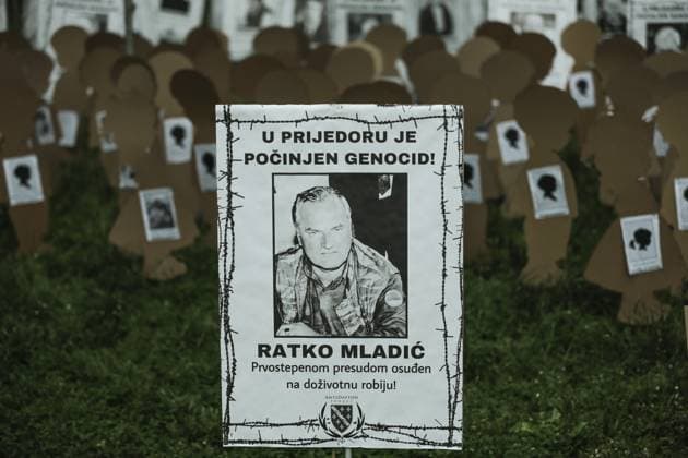 Bosnia marks Prijedor Victims on the White Ribbon Day SARAJEVO, BOSNIA AND HERZEGOVINA - MAY 31: Pictures of war criminals Former Bosnian Serb General Ratko Mladic and ex-Republika Srpska leader Radovan Karadzic are seen as pictures of the victims who were killed in wartime by Serbs in city of Prijedor are being displayed during White Ribbon Day in Sarajevo, Bosnia and Herzegovina on May 31, 2021. White Ribbon Day has been marked since 2012 to remember the civilians who put white ribbons on their arms and hang white sheets on their houses, were identified and killed by the Serbian soldiers in the city of Prijedor and its surrounding area during the war in 1992. Saraybosna Bosna Hersek. Editorial use only. Please get in touch for any other  Copyright: x2025xAnadoluxSamÄ±rxJordamovÄ±cx
