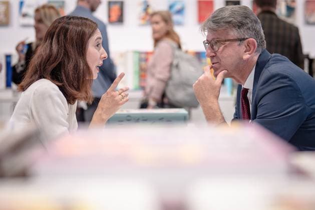 Minister of State for Culture Wolfram Weimer at the Taschen Verlag exhibition stand in conversation with publisher Marlene Taschen Minister of State for Culture Wolfram Weimer at Frankfurter Buchmesse 2025, Frankfurt Hesse Germany Exhibition Grounds