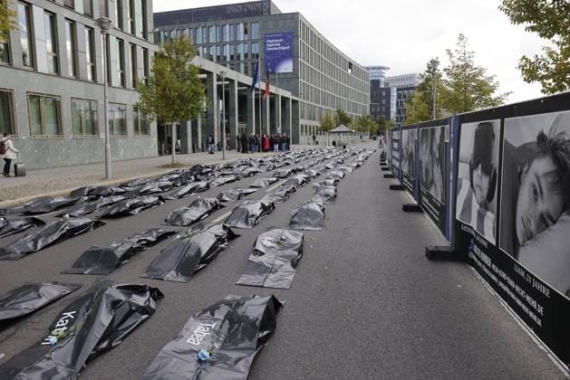 Germany, Berlin, ME CFS buried alive where is the Research Decade Demonstration in front of the Federal Ministry of Research, Technology and Space BMFTR