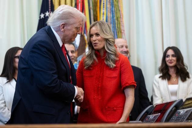 President Donald Trump shakes hands with EMD Serono Senior Vice President of US Fertility & Endocrinology Libby Horne during an announcement about in vitro fertilization in the Oval Office at the White House in Washington, DC on Thursday, October 16, 2025. WASP20251016129 FrancisxChung