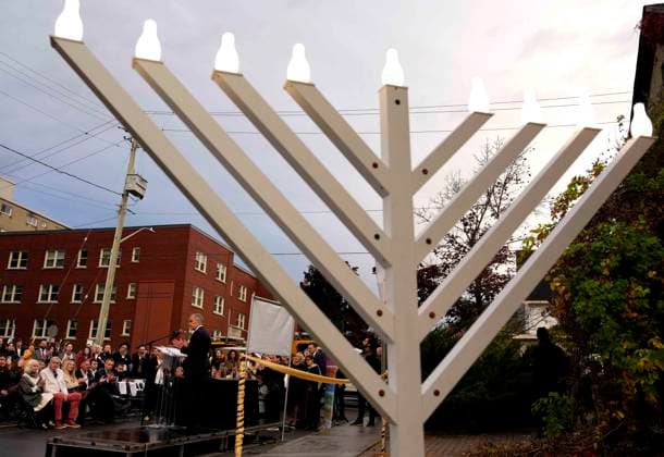 October 21, 2025, Ottawa, On, CAN: Prime Minister Mark Carney is seen past a menorah as he makes remarks at the opening of the Finkelstein Chabad Jewish Centre in Ottawa, on Tuesday, Oct. 21, 2025. Ottawa CAN - ZUMAc35_ 20251021_zaf_c35_180 Copyright: xJustinxTangx