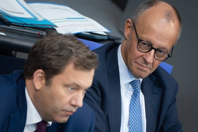 Federal Chancellor Friedrich Merz on the right with his Finance Minister and Vice Chancellor Lars Klingbeil on the government bench in the German Bundestag Session day 23 09 2025 in the German Bundestag , Berlin Berlin Germany Reichstag building
