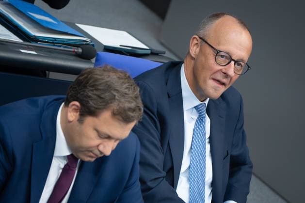 Federal Chancellor Friedrich Merz on the right with his Finance Minister and Vice Chancellor Lars Klingbeil on the government bench in the German Bundestag Session day 23 09 2025 in the German Bundestag , Berlin Berlin Germany Reichstag building