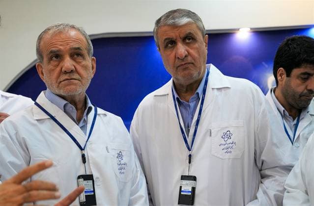 November 2, 2025, Tehran, Iran: Iranian President MASOUD PEZESHKIAN (L) and the head of Iran s Atomic Energy Organization MOHAMMAD ESLAMI (R) tour the countryÃ¢â‚¬â ¢s nuclear facilities in Tehran. During their visit to the Atomic Energy Organization and the nuclear power plant, they reviewed Iran s nuclear achievements and met with senior managers in the nuclear industry. Tehran Iran - ZUMAi98_ 20251102_zih_i98_020 Copyright: xAeoix