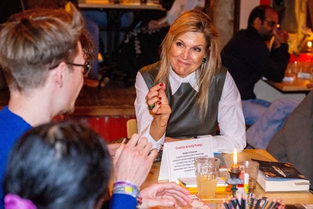 Amsterdam, The Netherlands, 2025-11-03 20:35:45 AMSTERDAM, 03-11-2025, The Offline Club. Queen Maxima during a visit to The Offline Club in Amsterdam. The Offline Club is a social enterprise focused on fostering genuine, personal connections in a time when screens and digital distractions are playing an increasingly important role. PHOTO: NLBeeld Patrick van Emst Credit: NL Beeld Patrick van Emst  Copyright: xx x