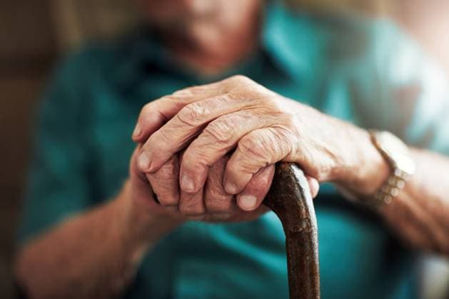 Senior man, hands and support with cane for old age, osteoporosis or care in retirement home. Closeup of elderly, pensioner or male person with a disability or walking stick for stability at house Senior man, hands and support with cane for old age, osteoporosis or care in retirement home. Closeup of elderly, pensioner or male person with a disability or walking stick for stability at house., model released, , 59800336.jpg RECORD DATE NOT STATED