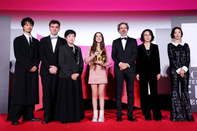 Takumi Saito, Matthieu Laclau, Yuriko Koike, Wardi Eilabouni, Carlo Chatrian, Vivian Qu, Gwey Lun-Mei, November 05, 2025 - Takumi Saito, Matthieu Laclau, Yuriko Koike, Wardi Eilabouni, Carlo Chatrian, Vivian Qu, Gwey Lun-Mei, speak after winning Tokyo Grand Prix The Governor of Tokyo Award for the film Palestine 36 during the 38th Tokyo International Film Festival. award ceremony, in Tokyo, Japan on November 05, 2025. aflo_309478939