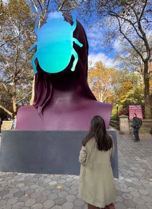 November 6, 2025, New York, New York, USA: A view of the public sculpture First Sun by Kuwaiti artist Monira Al Qadiri seen on display in Central Park, at the Doris C. Freedman Plaza. The 17-foot-tall painted aluminum sculpture is inspired by the ancient Egyptian deity Khepri reimaged as a contemporary monument. New York USA - ZUMAk03_ 20251106_zaf_k03_060 Copyright: xNancyxKaszermanx