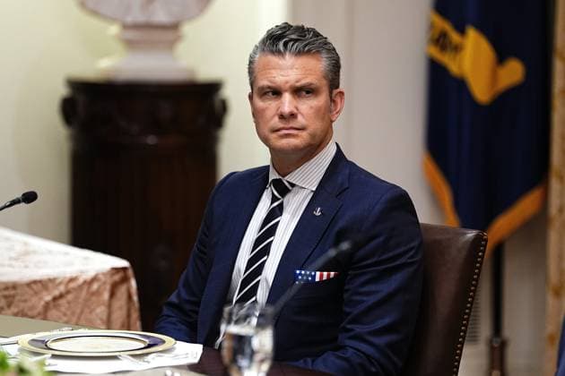 United States Secretary of War Pete Hegseth looks on as Prime Minister of Hungary Viktor Orban (not pictured) speaks to US President Donald J Trump during a bilateral lunch in the Cabinet Room of the White House in Washington, DC, USA, on Friday, November 7, 2025. Copyright: xCNPx xMediaPunchx