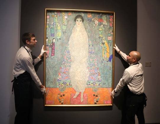 November 7, 2025, New York, New York, USA: Handlers seen with the Bildnis Elisabeth Lederer (Portrait of Elisabeth Lederer) by artist Gustav Klimt, part of the Leonard A. Lauder collection, estimate $150 million, seen on display during November Marquee Week 2025 during SothebyÃ¢â‚¬â ¢s Opening of the New Global Headquarters at the Breuer. New York USA - ZUMAk03_ 20251107_zaf_k03_052 Copyright: xNancyxKaszermanx