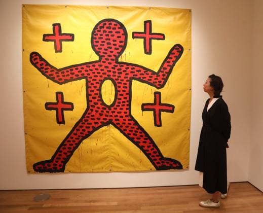 November 7, 2025, New York, New York, USA: A woman looks at Untitled, 1981, by artist Keith Haring, estimate $2.2 million - $3.2 million, during November Marquee Week 2025 during SothebyÃ¢â‚¬â ¢s Opening of the New Global Headquarters at the Breuer. New York USA - ZUMAk03_ 20251107_zaf_k03_063 Copyright: xNancyxKaszermanx