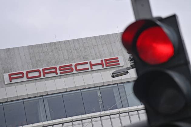 Porsche Center Zuffenhausen at Porscheplatz in Stuttgart Zuffenhausen, plant, group headquarters, Porsche lettering Porsche Automobil Holding SE, red traffic light,