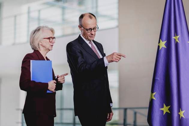 R L Friedrich Merz CDU , Federal Chancellor, and Monika Schnitzer, Chairwoman of the German Council of Economic Experts, at the presentation of the annual report of the German Council of Economic Experts to the Federal Chancellor in Berlin, 12 11 2025 Berlin Germany Copyright: xFlorianxGaertnerx