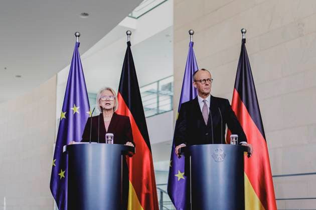 R L Friedrich Merz CDU , Federal Chancellor, and Monika Schnitzer, Chairwoman of the German Council of Economic Experts, at the presentation of the annual report of the German Council of Economic Experts to the Federal Chancellor in Berlin, 12 11 2025 Berlin Germany Copyright: xFlorianxGaertnerx