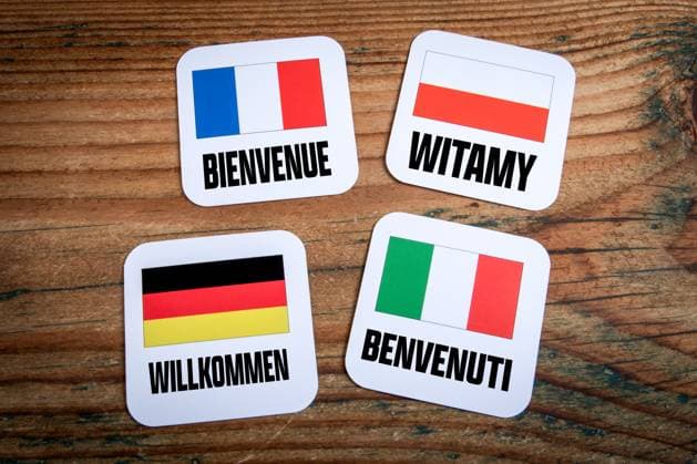 European welcome signs with country flags and languages. Copyright: xEdgarsxSermulisx