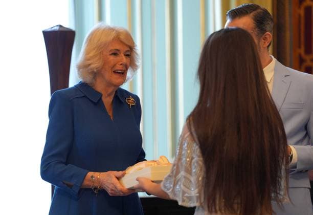 English National Ballet reception Queen Camilla, Patron of the English National Ballet, is given a pair of ballet pumps as a gift during a reception with staff, dancers, and supporters to celebrate the company s 75th anniversary and recognise the heritage, innovative creation of new works, and their learning and engagement programme, at Buckingham Palace in central London. Picture date: Wednesday November 12, 2025., Credit:Yui Mok Avalon UK, London  Copyright: xYuixMokx xAvalonx 1052047792