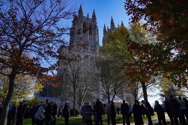 Attendees stand in line to enter the celebration of life ceremony for Dr. Jane Goodall, DBE at the National Cathedral on Wednesday, November 12, 2025 in Washington, DC.  WAP202511129222 LeighxVogel
