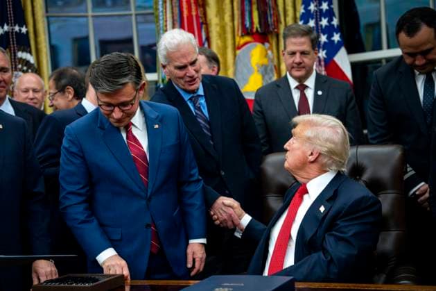 President Donald Trump shakes hands with House Minority Whip Tom Emmer, R-MN, after signing the funding package to re-open the federal government in the Oval Office of the White House in Washington, DC, on November 12, 2025. The short-term spending bill fund the government through January 30 and end the longest shutdown in U.S. History. WAP20251112355 BONNIExCASH