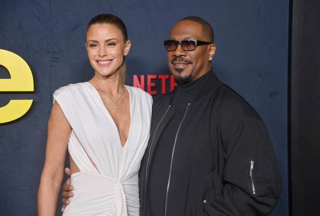 Actor Eddie Murphy and his wife Paige Butcher attend the premiere of Netflix s biographical documentary Being Eddie at the Tudum Theater Los Angeles on Wednesday, November 12, 2025. Storyline: Follows a comprehensive look at Eddie Murphy s life and career.  LAP2025111220 JIMxRUYMEN