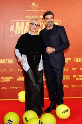 News - Il Maestro - Photocall A guest and Pierfrancesco Favino attend the Il Maestro photocall at Cinema Anteo on November 12, 2025 in Milan, Italy. Photo: Cinzia Camela. Milan Cinema Anteo Italy Copyright: xCinziaxCamelax xLiveMediax LPN_2141496