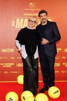 News - Il Maestro - Photocall A guest and Pierfrancesco Favino attend the Il Maestro photocall at Cinema Anteo on November 12, 2025 in Milan, Italy. Photo: Cinzia Camela. Milan Cinema Anteo Italy Copyright: xCinziaxCamelax xLiveMediax LPN_2141498