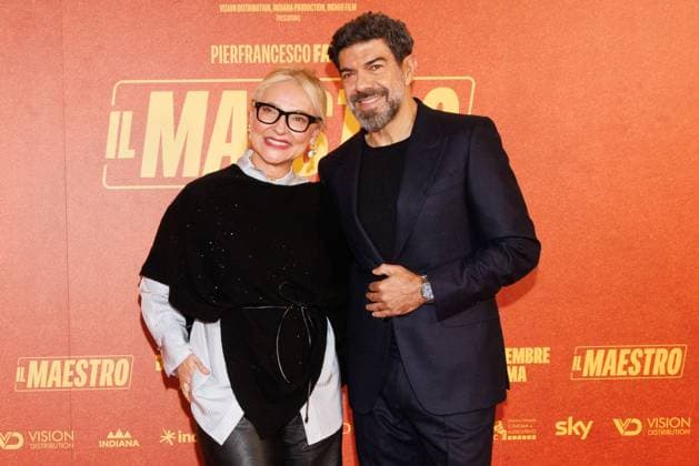 News - Il Maestro - Photocall A guest and Pierfrancesco Favino attend the Il Maestro photocall at Cinema Anteo on November 12, 2025 in Milan, Italy. Photo: Cinzia Camela. Milan Cinema Anteo Italy Copyright: xCinziaxCamelax xLiveMediax LPN_2141502