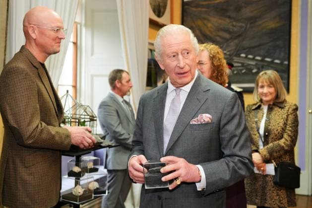King Charles III visits Wales Britain s King Charles III holds a fossil as he joins a celebratory reception marking Cyfarthfa Castle s 200th anniversary and the King s birthday in Merthyr Tydfil, Wales, Friday, Nov. 14, 2025., Credit:Kin Cheung Avalon GBR, Merthyr Tydfil  Copyright: xKinxCheungx xAvalonx 1052414378