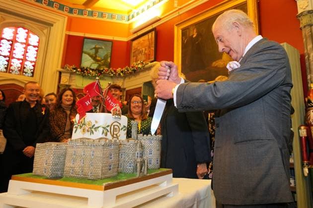 King Charles III visits Wales Britain s King Charles III prepares a knife to cut a cake in the shape of the castle as he joins a celebratory reception marking Cyfarthfa Castle s 200th anniversary and the King s birthday in Merthyr Tydfil, Wales, Friday, Nov. 14, 2025., Credit:Kin Cheung Avalon GBR, Merthyr Tydfil  Copyright: xKinxCheungx xAvalonx 1052413530