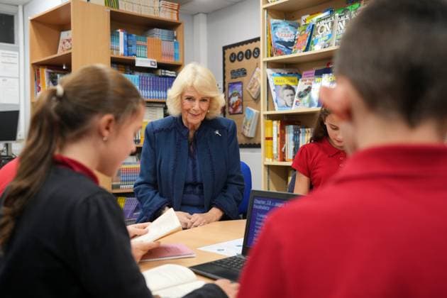 King Charles III visits Wales Britain s Queen Camilla listens to students as she visits Cyfarthfa Primary School to join pupils taking part in a guided reading programme and attends a school assembly in Merthyr Tydfil, Wales, Friday, Nov. 14, 2025., Credit:Kin Cheung Avalon GBR, Merthyr Tydfil  Copyright: xKinxCheungx xAvalonx 1052414393