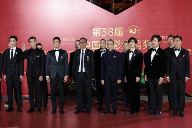 XIAMEN, CHINA - NOVEMBER 15: The cast and crew of Penghu Hai Zhan arrive at the red carpet for the closing ceremony during the 38th China Golden Rooster Awards on November 15, 2025 in Xiamen, Fujian Province of China.  Copyright: xVCGx 111604071948