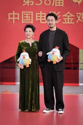 XIAMEN, CHINA - NOVEMBER 15: Actress Wang Fuli (L) and actor Wang Chuanjun arrive at the red carpet for the closing ceremony during the 38th China Golden Rooster Awards on November 15, 2025 in Xiamen, Fujian Province of China.  Copyright: xVCGx 111604092995
