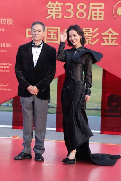 XIAMEN, CHINA - NOVEMBER 15: Actress Wang Luodan (R) and director Chen Guoxing arrive at the red carpet for the closing ceremony during the 38th China Golden Rooster Awards on November 15, 2025 in Xiamen, Fujian Province of China.  Copyright: xVCGx 111604062315