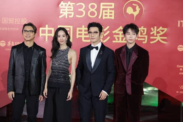 XIAMEN, CHINA - NOVEMBER 15: (L-R) Director Sam Quah, actress Ning Chang, actor Huang Xiaoming and actor Peng Yuchang of The Fire Raven arrive at the red carpet for the closing ceremony during the 38th China Golden Rooster Awards on November 15, 2025 in Xiamen, Fujian Province of China.  Copyright: xVCGx 111604072274