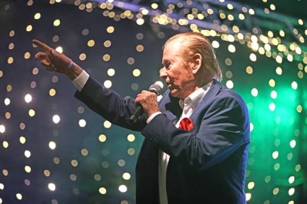German music legends Born on July 29, 1943, Lothar Bernhard Walter, who achieved great success as a pop singer and film actor under his stage name Michael Holm, sings on a stage in Essen Steele at the local Christmas market in the run-up to Christmas Essen North Rhine-Westphalia Germany Steele