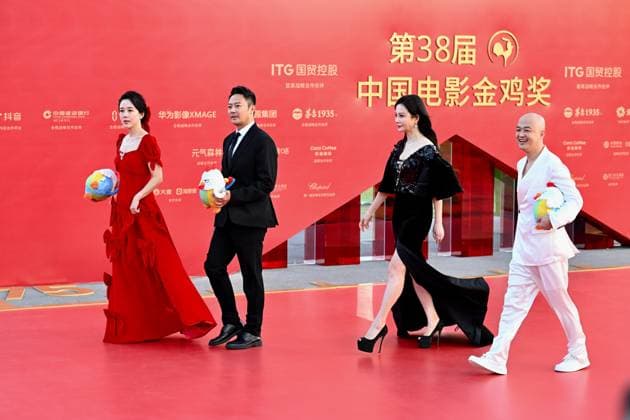 XIAMEN, CHINA - NOVEMBER 15: Actress Yan Danchen, actor Yin Xiaotian, actress Tao Hong and actor Bao Beier arrive at the red carpet for the closing ceremony during the 38th China Golden Rooster Awards on November 15, 2025 in Xiamen, Fujian Province of China.  Copyright: xChinaxNewsxServicex 111604092062