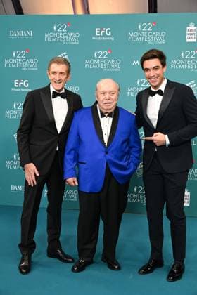 Monk, Italy: Monte Carlo, 22nd Monte Carlo Film Festival De La ComÃ die. Red carpet awards ceremony. Pictured: Ezio Greggio, Gabriele Greggio, Lino Banfi Monk Italy  - ZUMAp169 20251115_zea_p169_893 Copyright: xManuelexMangiarottix
