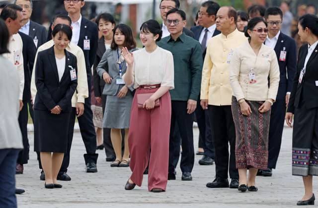 Japan Princess Aiko in Laos Japanese Princess Aiko waves to the crowd as she walks to the Patuxai war monument in Vientiane on Nov. 18, 2025, as she visits Laos on her first official overseas trip, marking the 70th anniversary of the establishment of diplomatic ties.  A14AA0005043779P