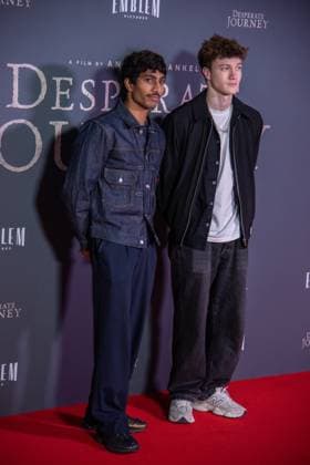 November 18, 2025, London, United Kingdom: Noah Williams and guest attend the London Premiere of Desperate Journey at Odeon Luxe Leicester Square. London United Kingdom - ZUMAs197 20251118_aaa_s197_210 Copyright: xLoredanaxSangiulianox