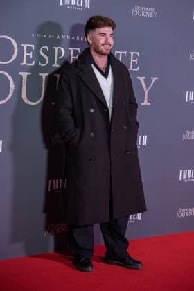 November 18, 2025, London, United Kingdom: A guest attends the London Premiere of Desperate Journey at Odeon Luxe Leicester Square, London United Kingdom - ZUMAs197 20251118_aaa_s197_283 Copyright: xLoredanaxSangiulianox