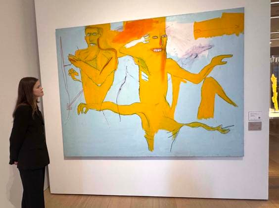 November 18, 2025, New York, New York, USA: A woman looks at Ã¢â‚¬ËœExerciseÃ¢â‚¬â ¢ by artist Jean-Michel Basquiat, 1984, estimate $3 million - $4 million, seen on display at the press preview for Marquee Week Fall 2025 Modern and Comtempory Art held at Phillips Auction House New York. New York USA - ZUMAk03_ 20251118_zaf_k03_115 Copyright: xNancyxKaszermanx