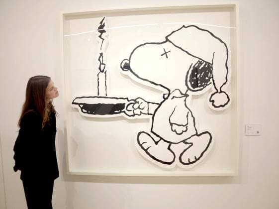 November 18, 2025, New York, New York, USA: A woman looks at Ã¢â‚¬ËœUntiitled (MBFS8)Ã¢â‚¬â ¢ by artist KAWS, 2015, estimate $150,000 - $200,000, seen on display at the press preview for Marquee Week Fall 2025 Modern and Comtempory Art held at Phillips Auction House New York. New York USA - ZUMAk03_ 20251118_zaf_k03_098 Copyright: xNancyxKaszermanx