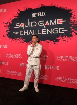 November 18, 2025, Hollywood, California, USA: Joel Kim Booster on the red carpet of the Netflix Squid Game: The Challenge Finale on Tuesday, November 18, 2025 at the Egyptian Theatre in Hollywood, California. JAVIER ROJAS PI Hollywood USA - ZUMAp124 20251118_zaa_p124_037 Copyright: xJavierxRojasx