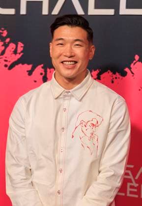 November 18, 2025, Hollywood, California, USA: Joel Kim Booster on the red carpet of the Netflix Squid Game: The Challenge Finale on Tuesday, November 18, 2025 at the Egyptian Theatre in Hollywood, California. JAVIER ROJAS PI Hollywood USA - ZUMAp124 20251118_zaa_p124_038 Copyright: xJavierxRojasx
