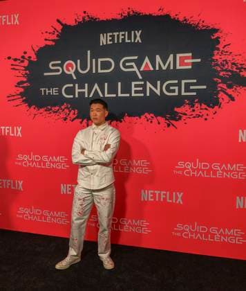 November 18, 2025, Hollywood, California, USA: Joel Kim Booster on the red carpet of the Netflix Squid Game: The Challenge Finale on Tuesday, November 18, 2025 at the Egyptian Theatre in Hollywood, California. JAVIER ROJAS PI Hollywood USA - ZUMAp124 20251118_zaa_p124_041 Copyright: xJavierxRojasx
