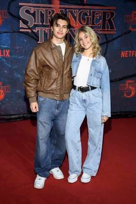abb Noah Miguel Oechsle Rodriguez and Lara Sprengler as guests on the red carpet at the big fan event with red carpet screening of the Netflix series STRANGER THINGS 5 at Tempelhof Airport on 18 11 2025 in Berlin Berlin Germany